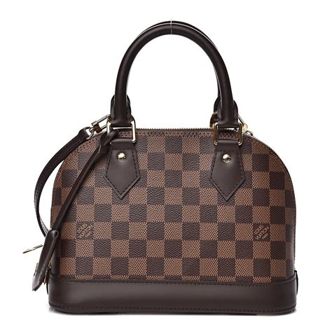 louis vuitton lv damier ebene de alma bb|lv handbag with braided handle.